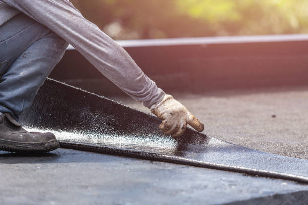 Professional Waterproofing technician working in Hartsville, IN